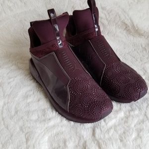 Burgundy Kylie Jenner puma tennis shoes.